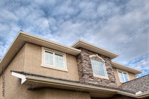 Wallpaper Mural Roofline showing gutter, soffit, windows, roof and stones Torontodigital.ca
