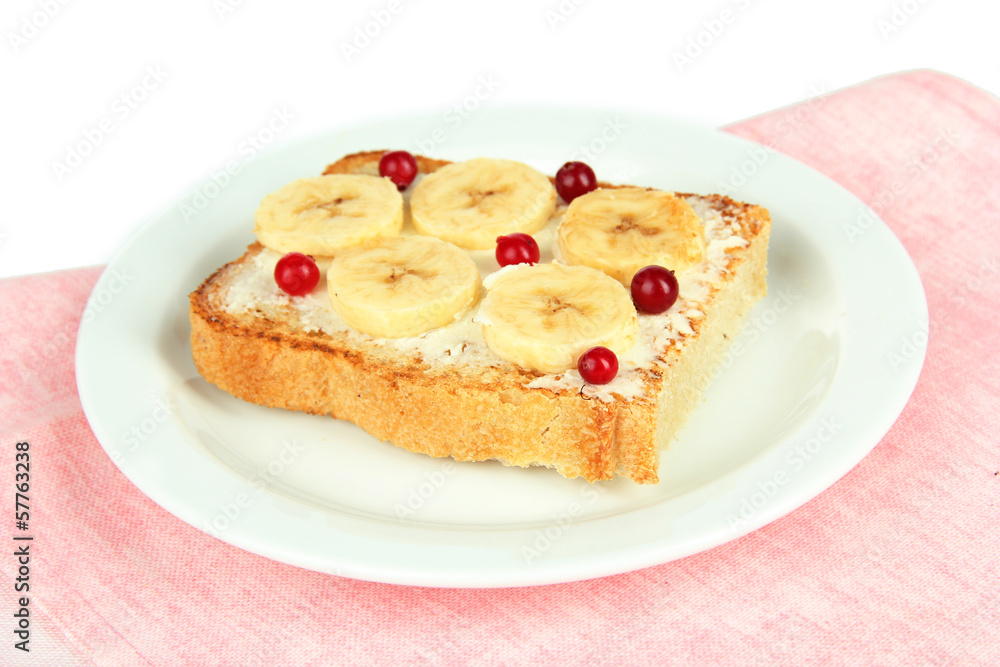 Delicious toast with bananas on plate close-up