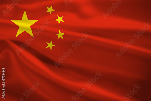 Peoples Republic of China flag blowing in the wind photo
