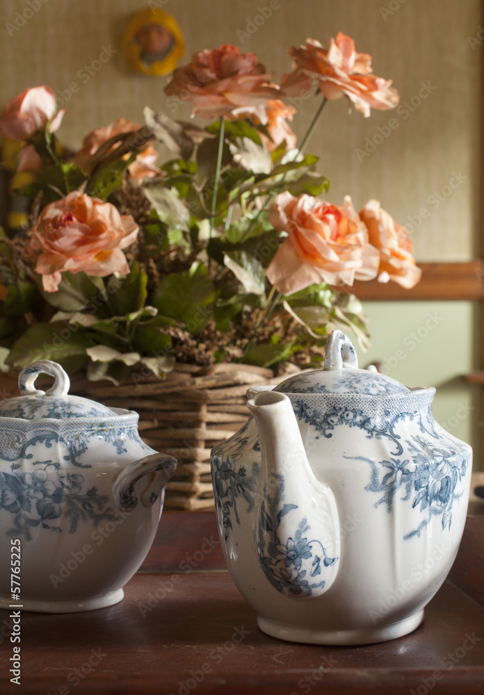 A antique tea set on a table