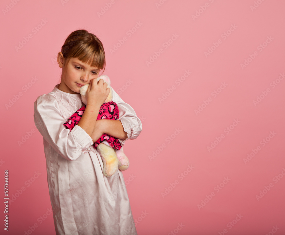 Little girl with a teddy bear Little girl with a teddy bear