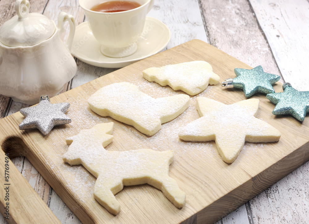 Homemade Christmas shortbread biscuit cookies with tea