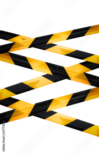 Black and yellow caution striped tapes isolated on white