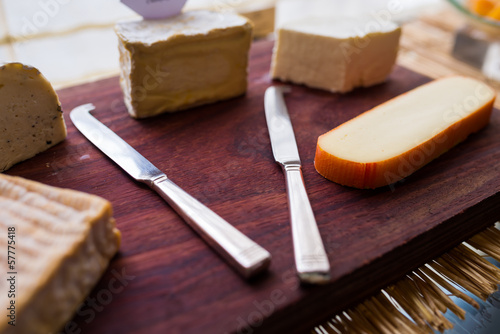 Butter knife with variety of cheese