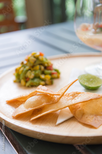 Nachos chips with salsa salad sauce