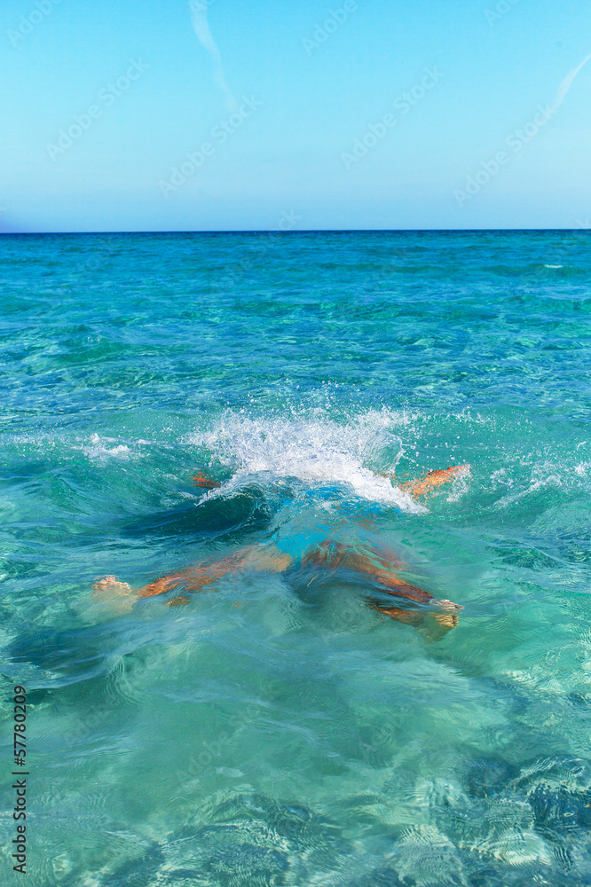 Swimmer in Mediterranean sea.