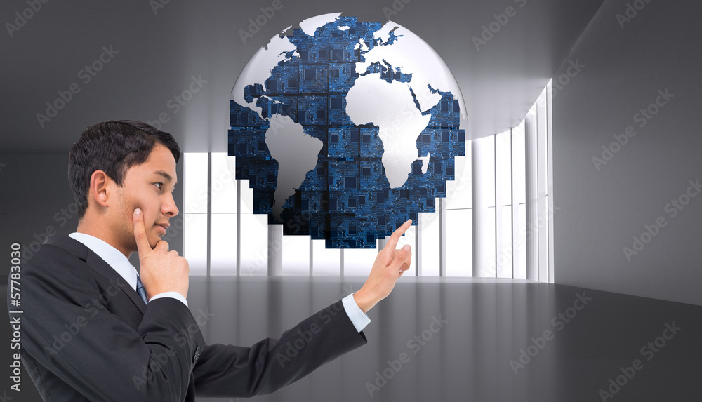 Composite image of thoughtful asian businessman pointing Composite image of thoughtful asian businessman pointing