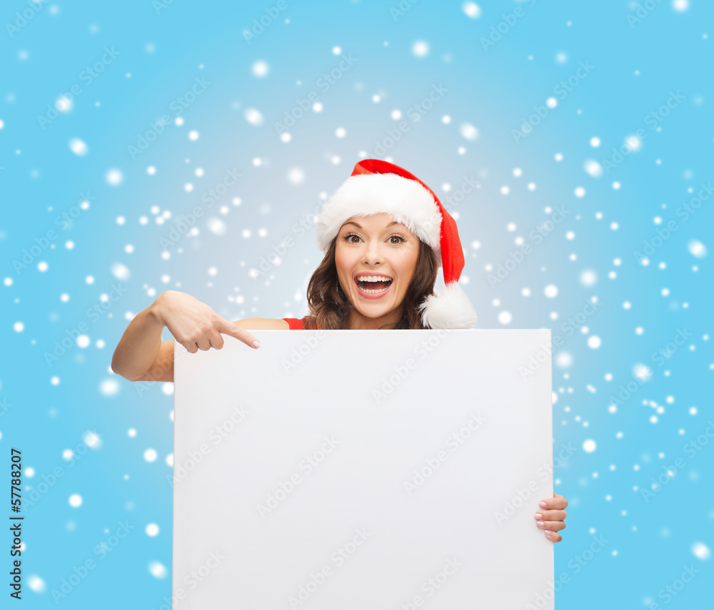 woman in santa helper hat with blank white board woman in santa helper hat with blank white board