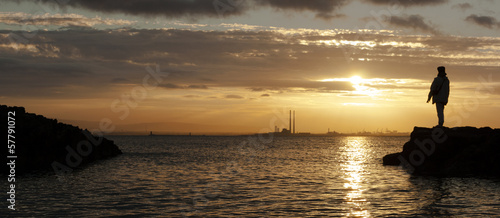 Sunset backlit with human silhouette