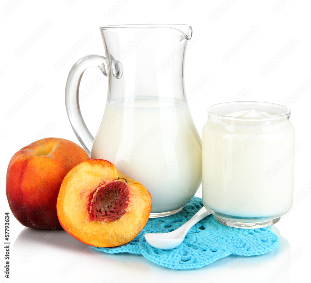 Fresh dairy products with peaches isolated on white Fresh dairy products with peaches isolated on white