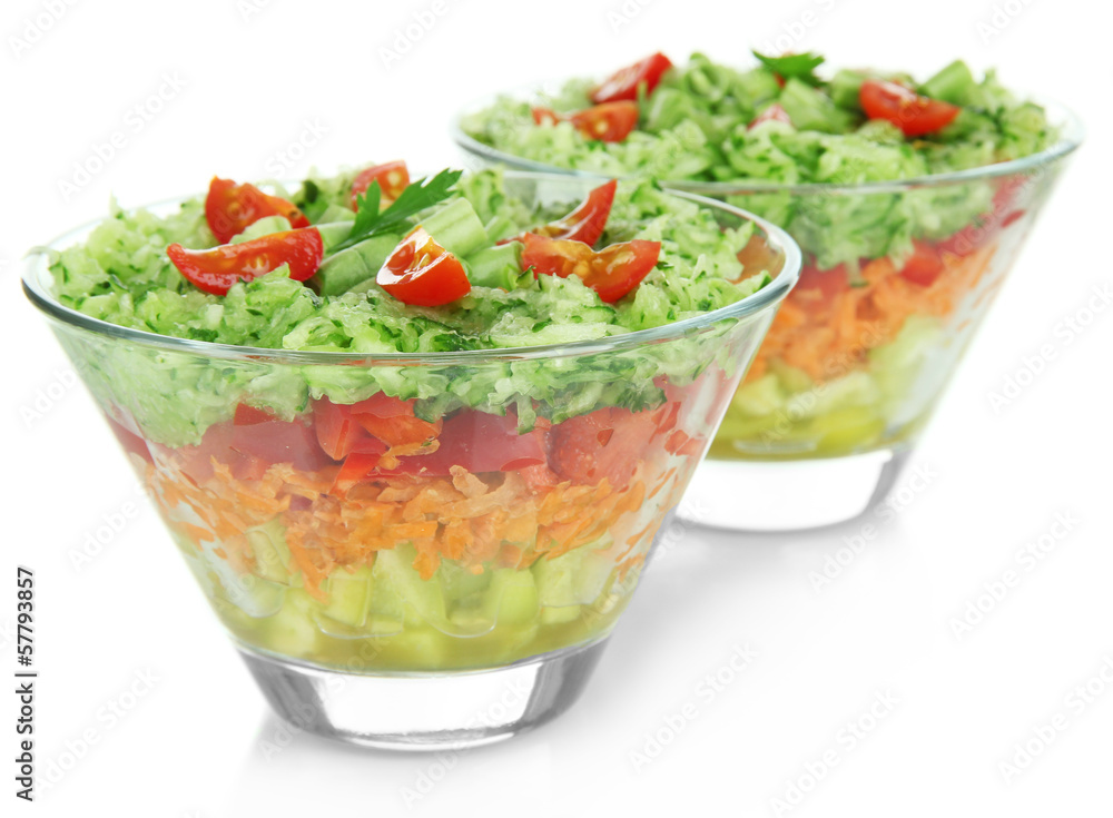 Tasty salad with fresh vegetables, isolated on white Tasty salad with fresh vegetables, isolated on white
