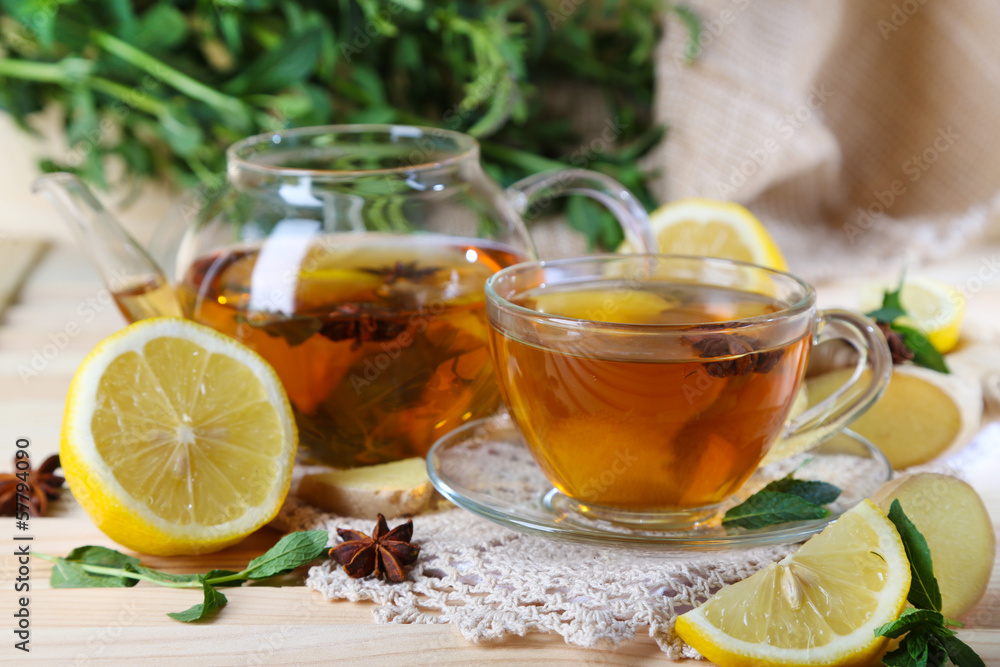 Kettle and cup of tea with ginger Kettle and cup of tea with ginger