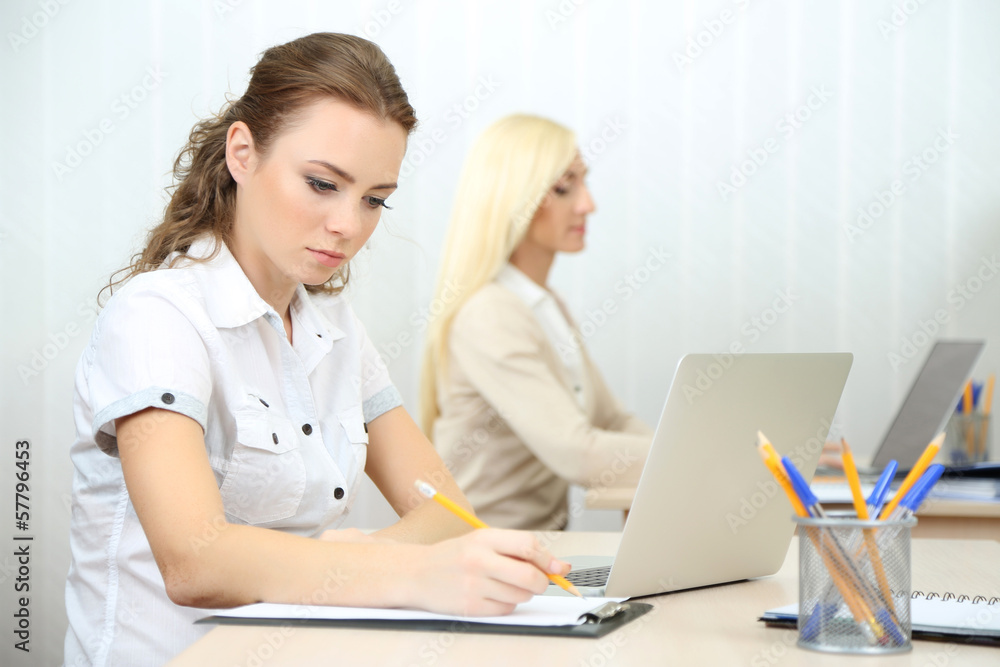 Woman in office at workplace