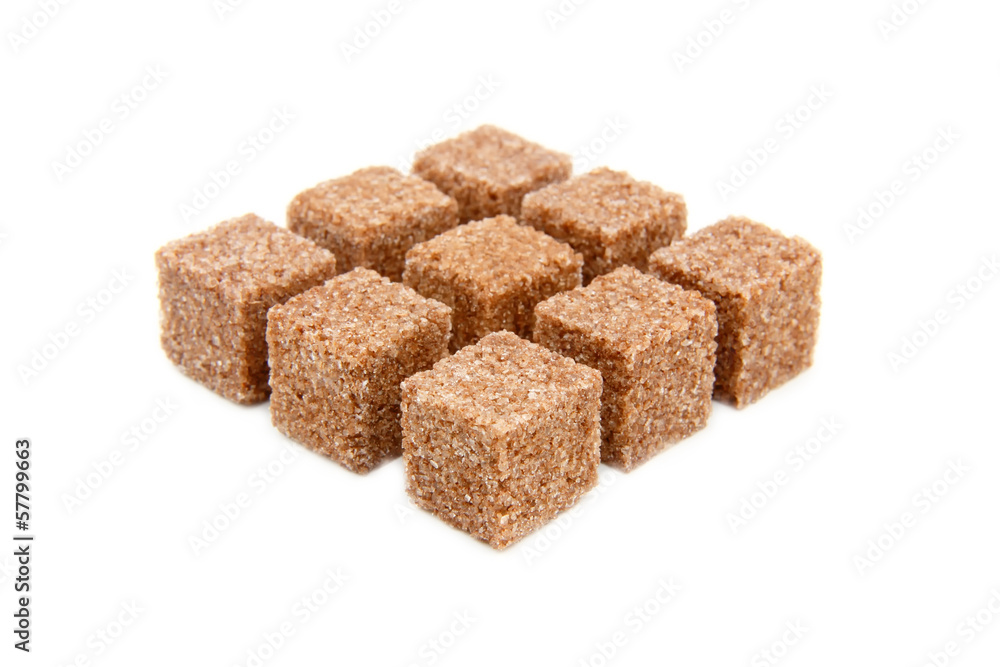 Cubes of sugar with cinnamon isolated Cubes of sugar with cinnamon isolated