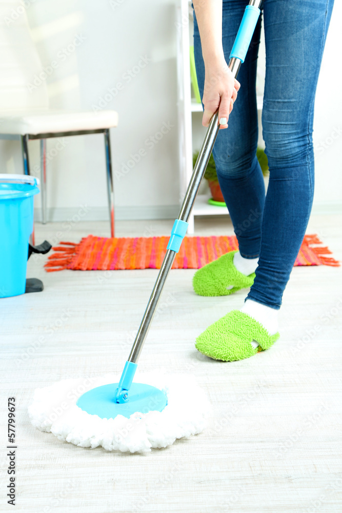 Mopping floor at home close-up Mopping floor at home close-up