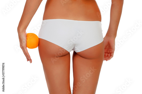 Girl in white underwear with a orange