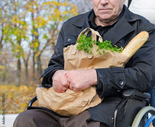 Handicapped man doing his grocery shopping