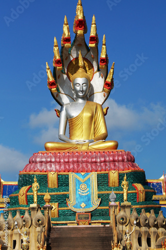Buddha image on blue sky photo