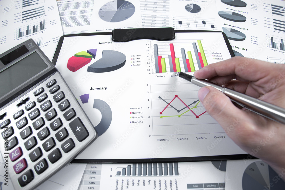 Obraz premium man hand and business report