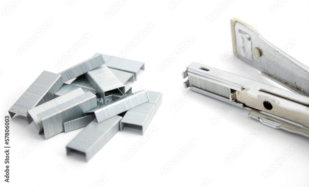 Stapler and staples isolated on white Stapler and staples isolated on white