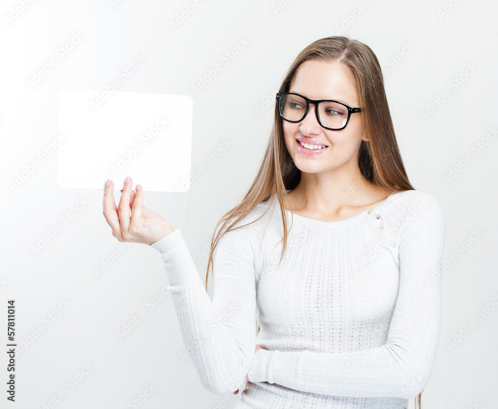 young smiling woman holding blank business card young smiling woman holding blank business card