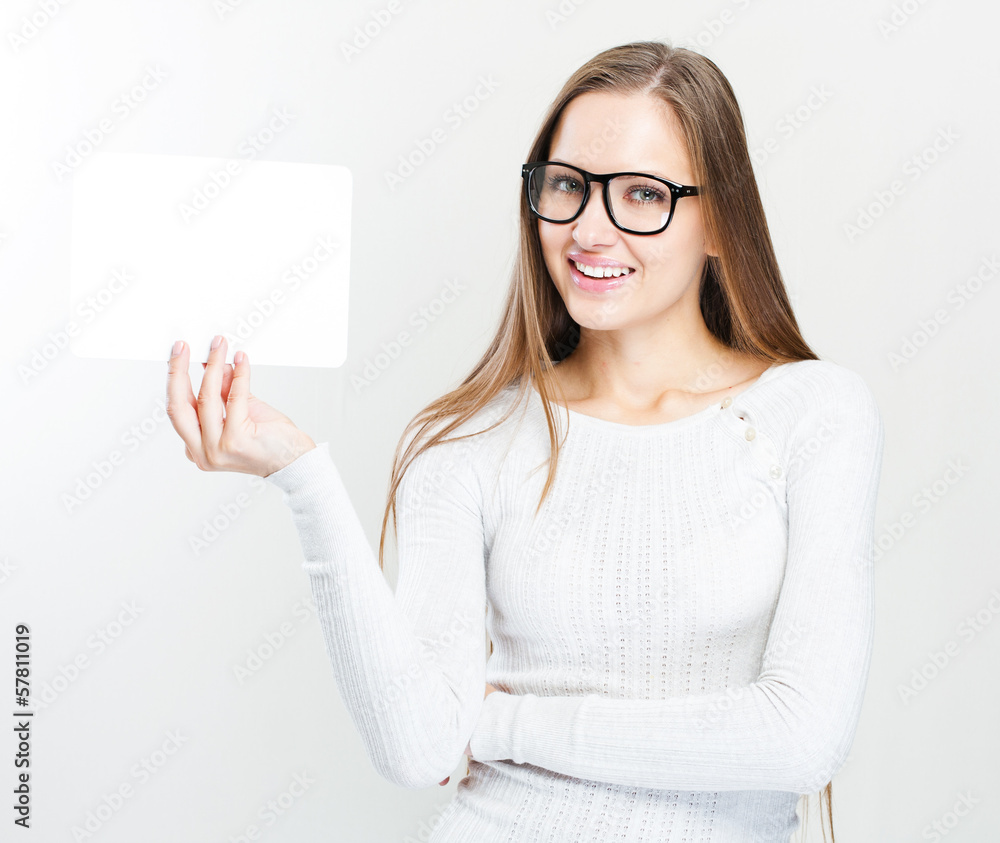 young smiling woman holding blank business card young smiling woman holding blank business card