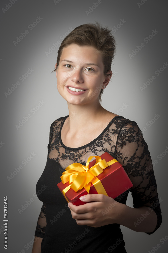 Woman in gown with present