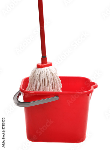 Red bucket with cleaning mop.