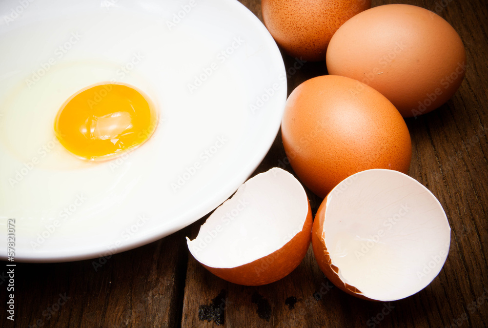 broken chicken eggs and egg yolk broken chicken eggs and egg yolk