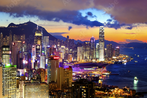Photography Crowded downtown and building in Hong Kong at sunset