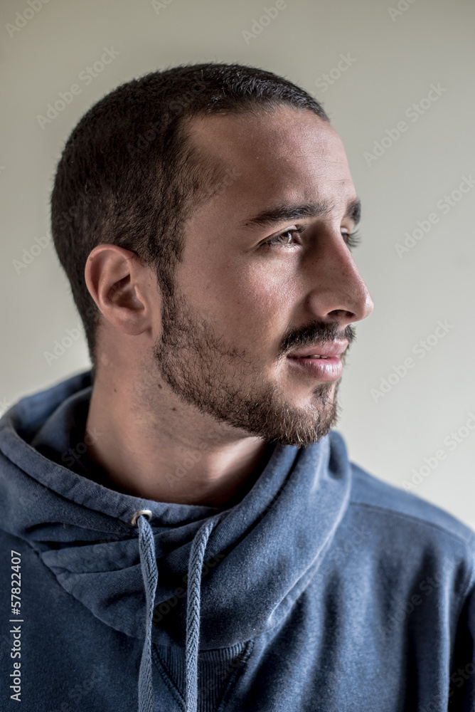 young stylish man with sport hat young stylish man with sport hat
