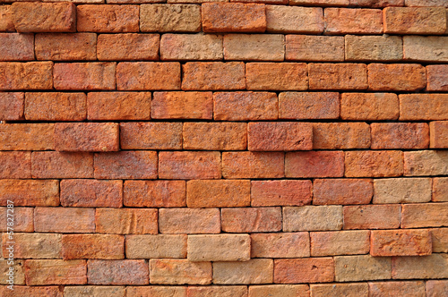 Vintage red brick wall, no smooth line.