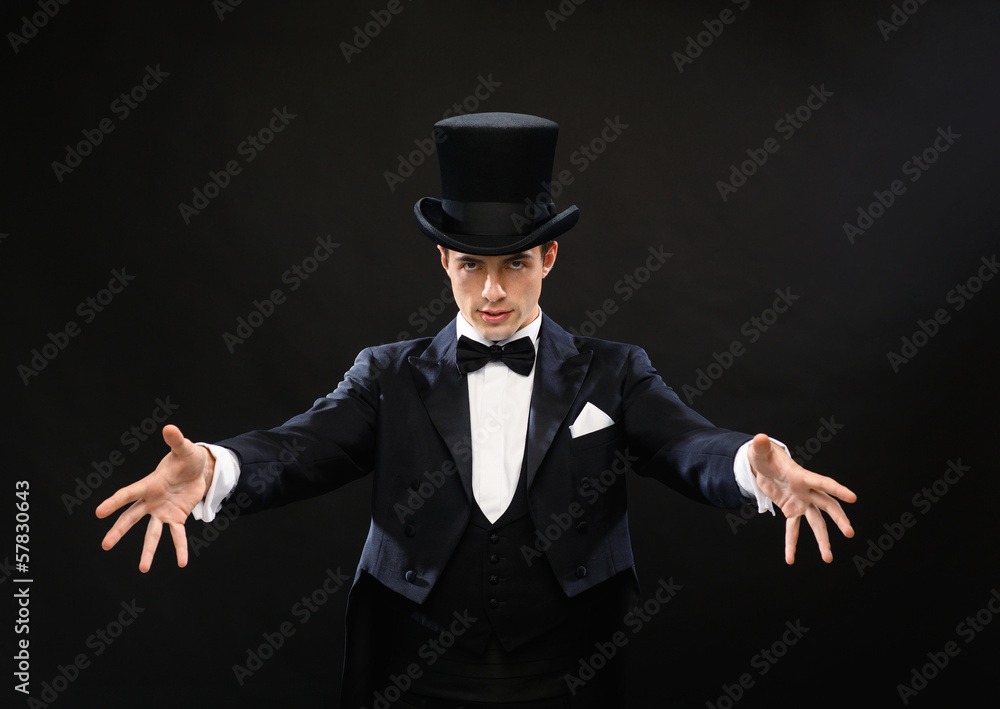 magician in top hat showing trick Stock Photo | Adobe Stock
