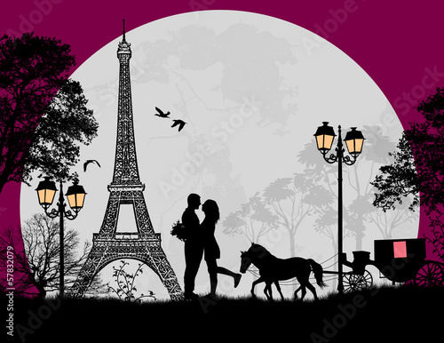 Carriage and lovers at night in Paris