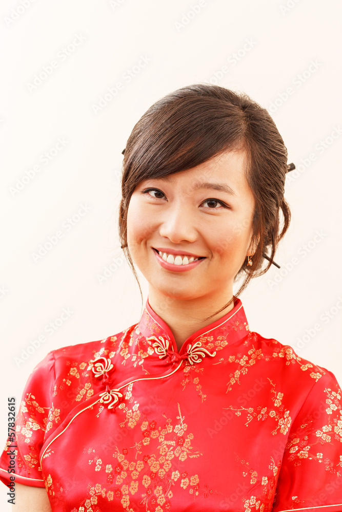 Chinese girl in traditional Chinese cheongsam Chinese girl in traditional Chinese cheongsam