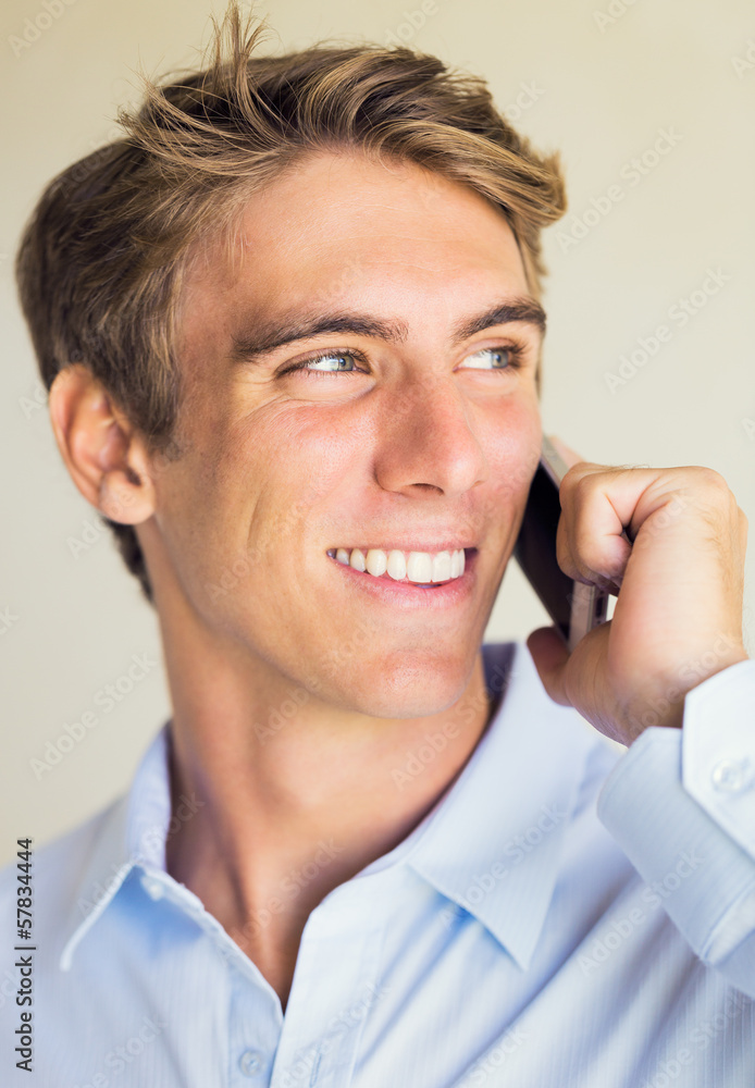 Young Professional, Handsome Man Using Smart Mobile Phone Young Professional, Handsome Man Using Smart Mobile Phone
