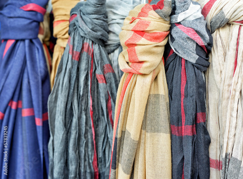 Different scarves on tourist market © tacna