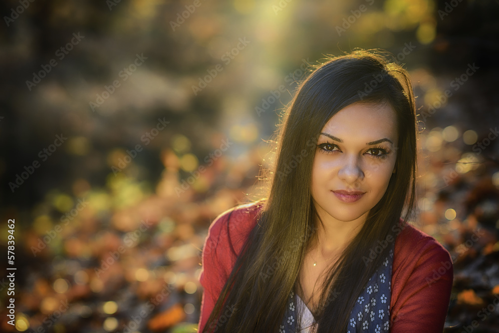 Young woman in a romantic autumn scenery Young woman in a romantic autumn scenery