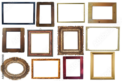 Collection of vintage wooden and golden empty frames isolated on