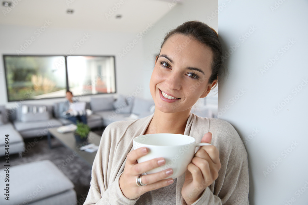 Beautiful woman at home drinking hot tea Beautiful woman at home drinking hot tea