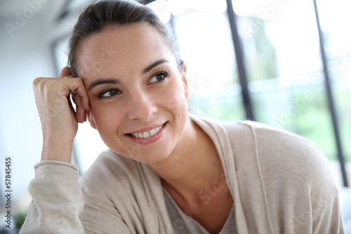 Gorgeous woman at home relaxing in living-room