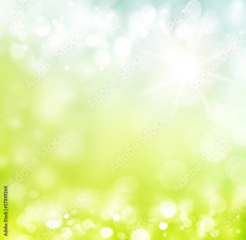 Spring or summer abstract background with bokeh lights.
