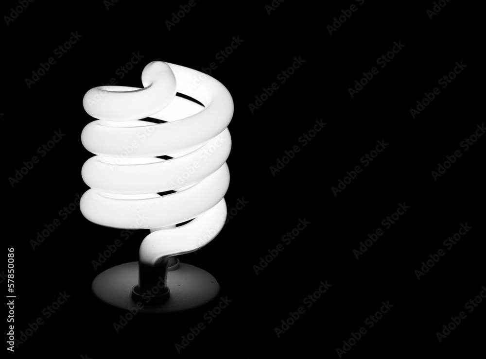 Energy saving light bulb, lamp, isolated over black Energy saving light bulb, lamp, isolated over black