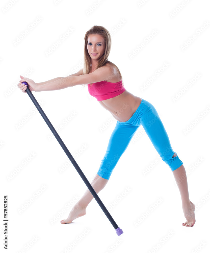 Studio shot of cute muscular girl with fitbar Studio shot of cute muscular girl with fitbar