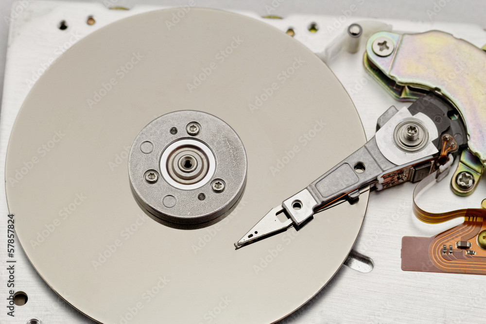 Open computer hard drive on white background Open computer hard drive on white background