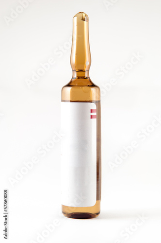 Brown ampule on white background