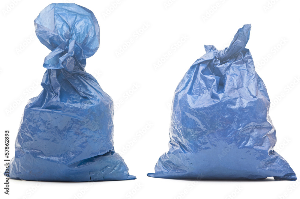 Fototapeta premium blue garbage bag with trash isolated on white
