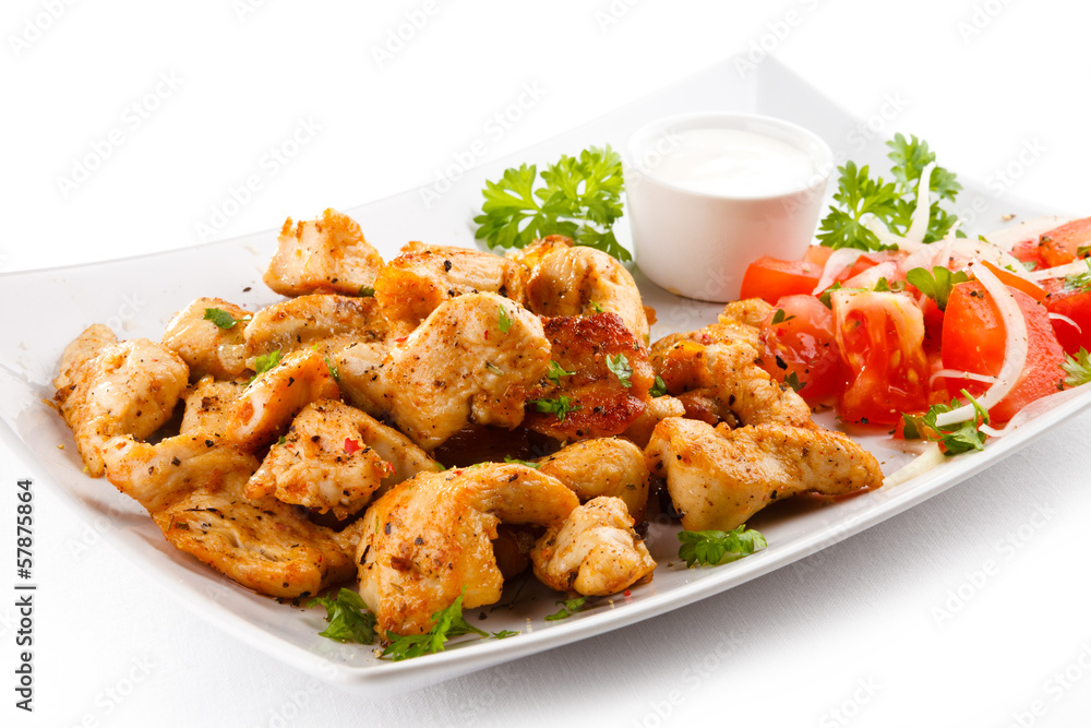 Grilled meat and vegetables on white background Grilled meat and vegetables on white background
