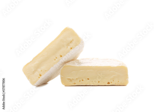 Two pieces of cheese brie.