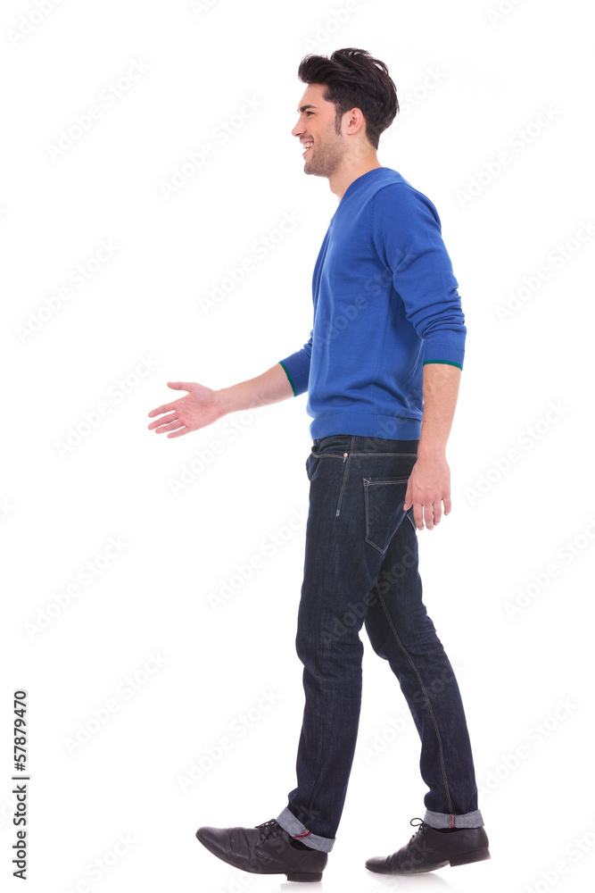 casual man in blue jeans and shirt walking casual man in blue jeans and shirt walking